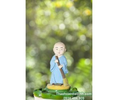 Tượng Chú Tiểu Đi Thuyền Lá Sen